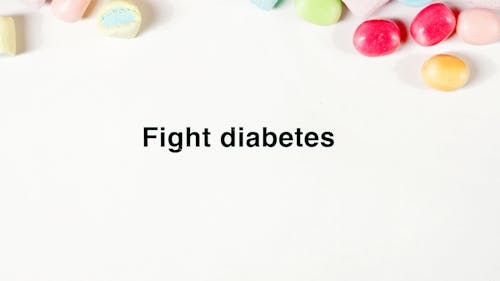 Assorted Candies and Fight Diabetes Slogan on White Background