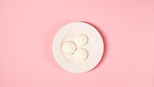 Meringues on White Ceramic Plate