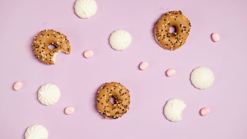 Free Brown Donuts on Pink Surface Stock Photo