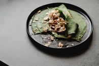 Green Vegetable on Black Plate