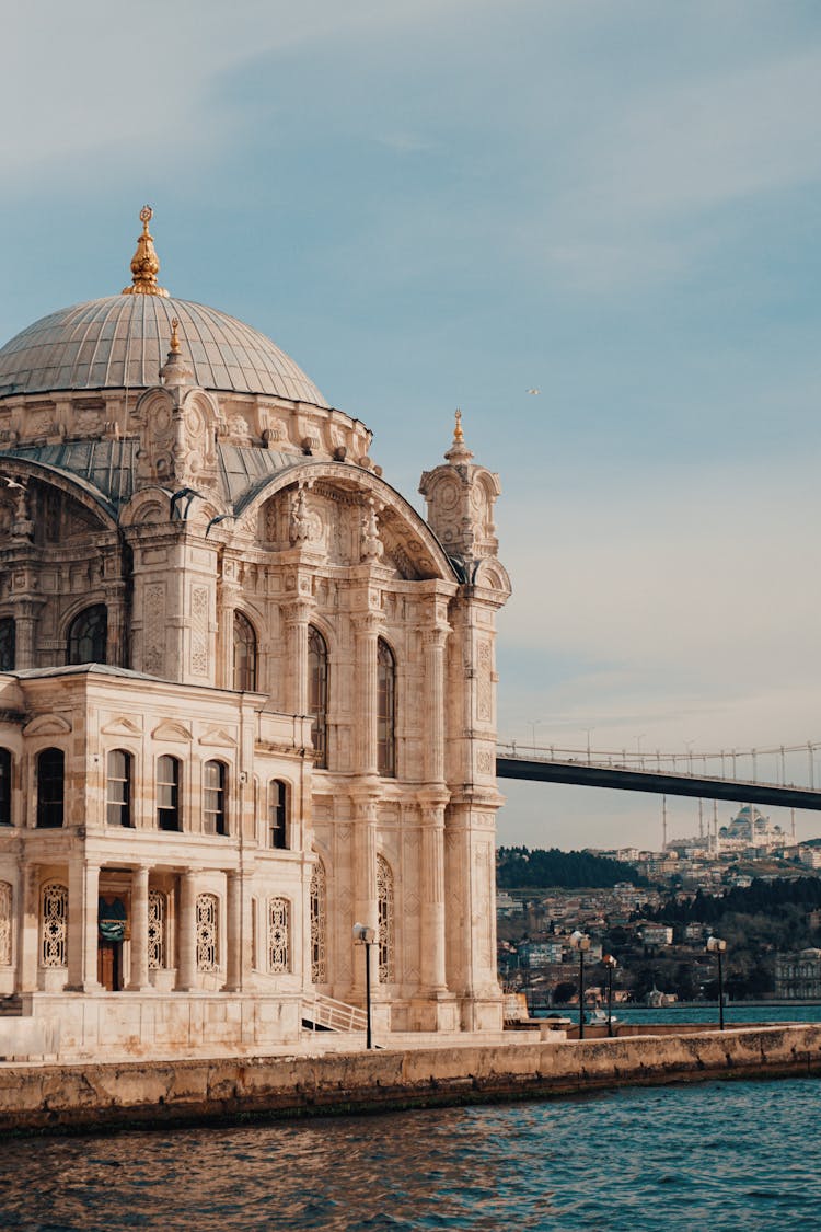 Ortaköy Mosque In Istanbul With The Bosphorus Bridge On Background