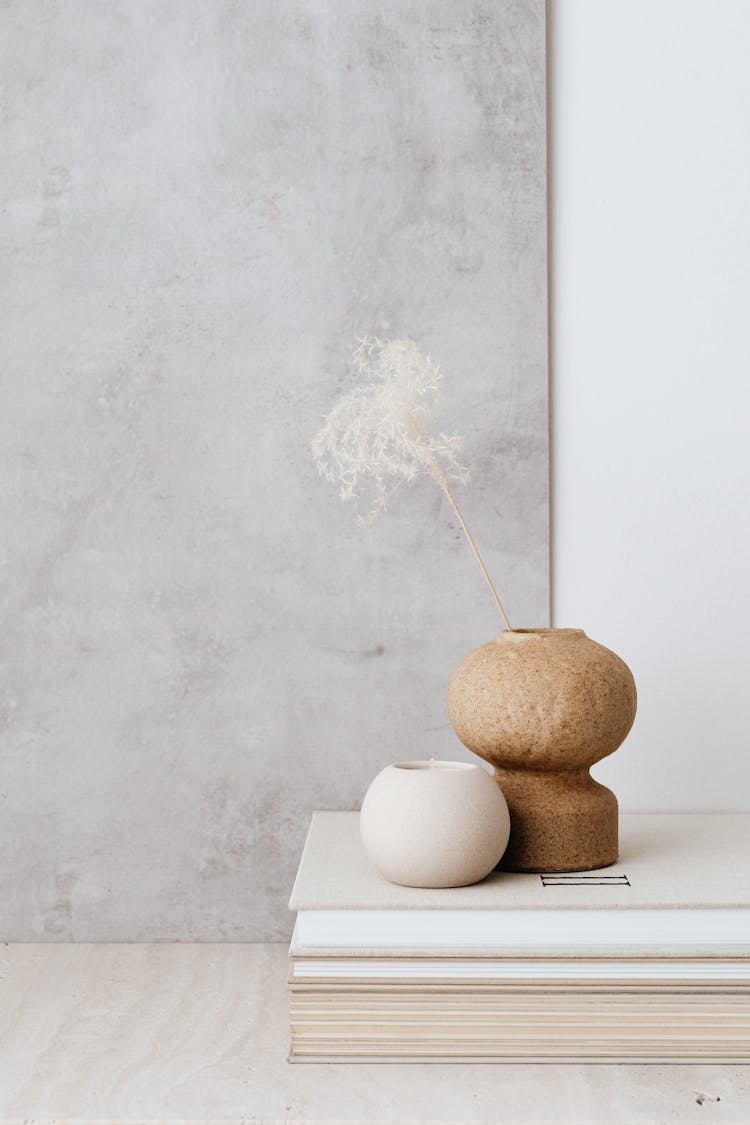 Minimalist Vases On Stack Of Books