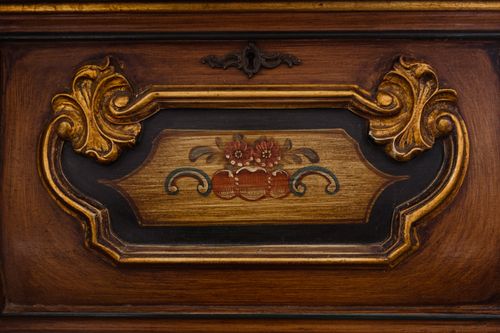 Free Close-up of antique wooden furniture with intricate carved design and vintage floral art. Stock Photo