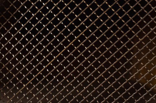 Free Squared Metal Mesh Fence in Close-up Shot Stock Photo
