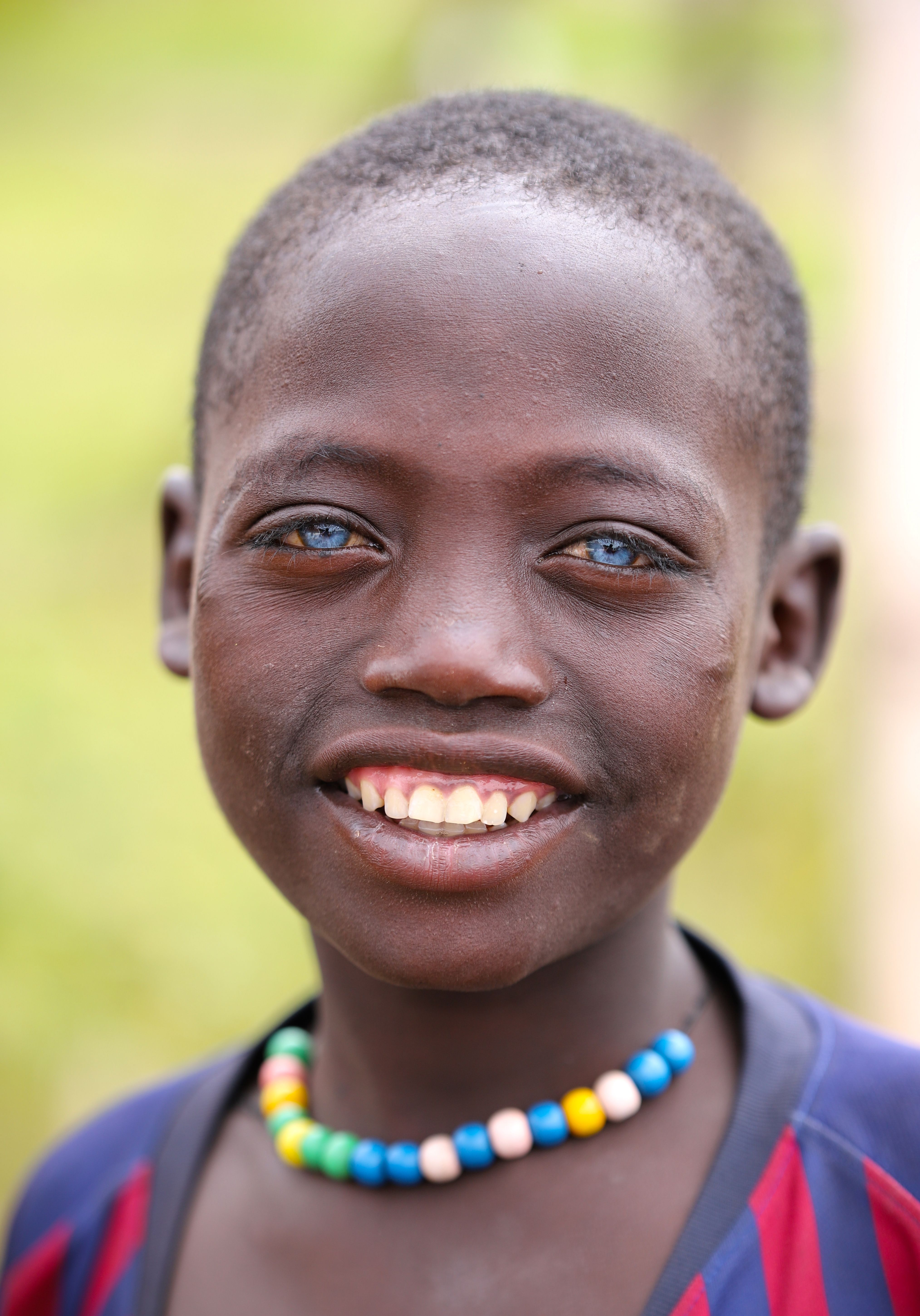 portrait-of-a-boy-with-blue-eyes-free-stock-photo