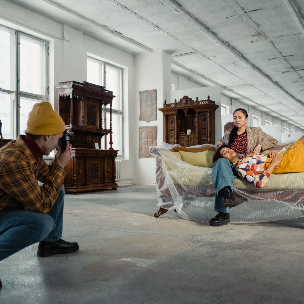 Rhu — professional movers carrying furniture on a house move