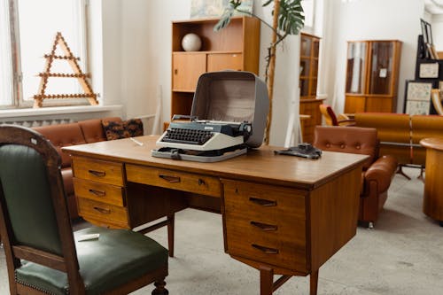 Typewriter on Wooden Table
