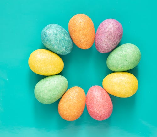 Pastel Color Painted Eggs On Turquoise Background
