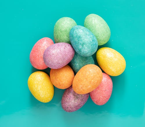 Free Yellow Blue and Pink Egg Shaped Candies Stock Photo