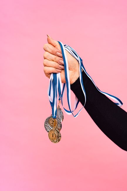 gold medal athlete podium celebration