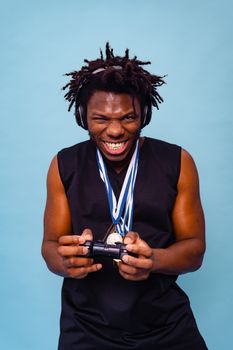 Energetic gamer celebrates victory with a game controller and medals.