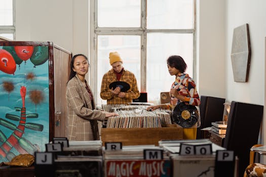 A diverse group of music enthusiasts exploring vinyl records in a cozy vintage store setting.