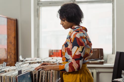 A Woman Shopping for Vinyl Records