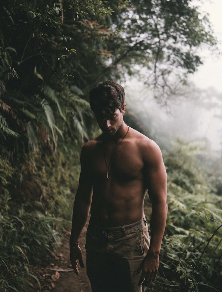 A Topless Man In The Forest