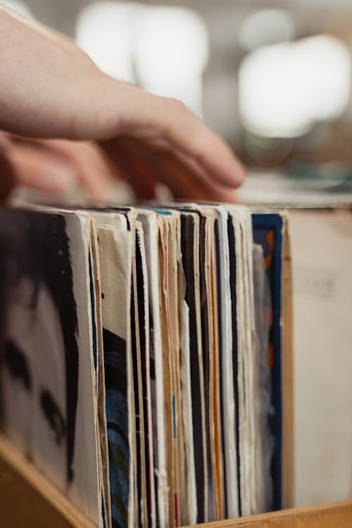 Free A Person Shopping for Vintage Vinyl Records Stock Photo