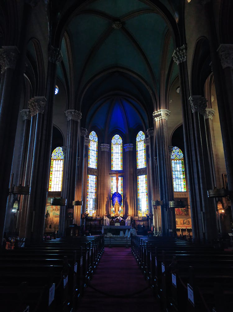 The Center Aisle Inside A Saint Anthony Of Padua Church