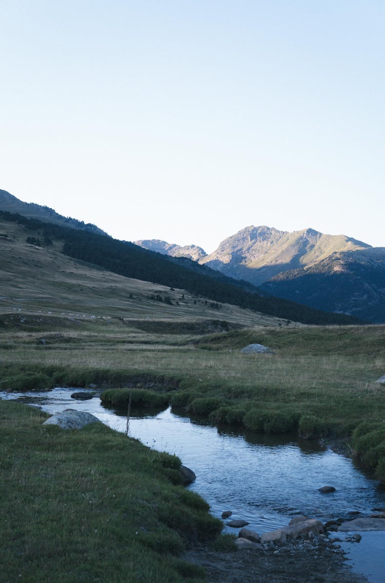 Stream Running Through Mountain Valley