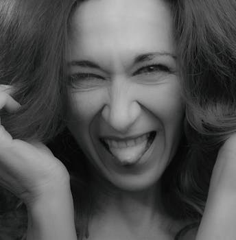 Captivating monochrome portrait of a woman making a playful face.