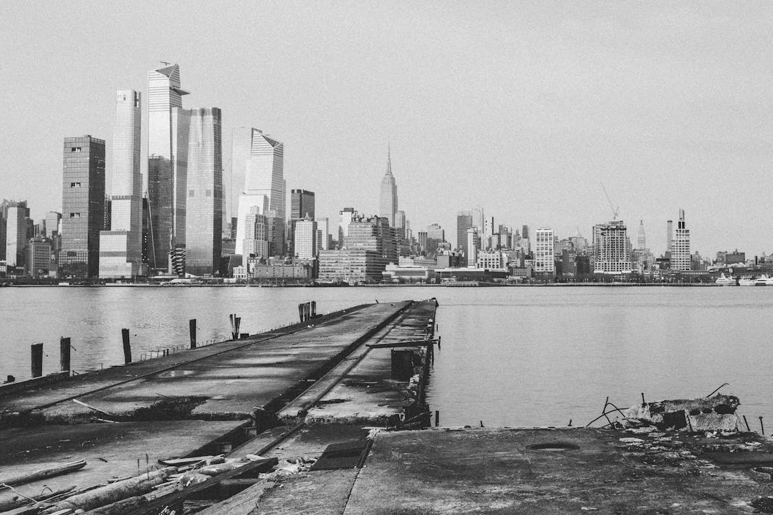 Grayscale Photo of City Skyline