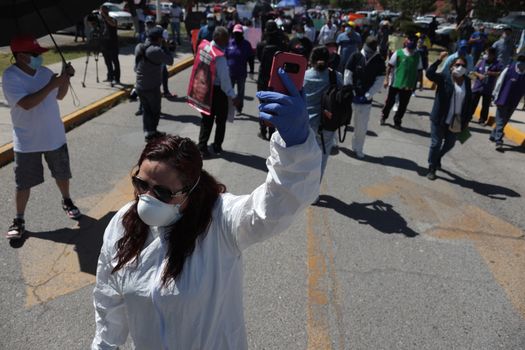 Group of People Protesting on the Street