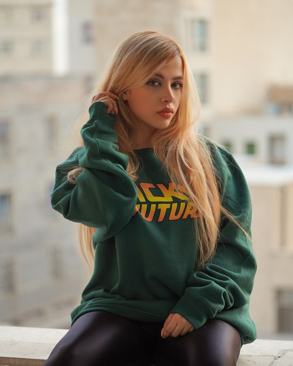Woman wearing a DIY embellished sweatshirt