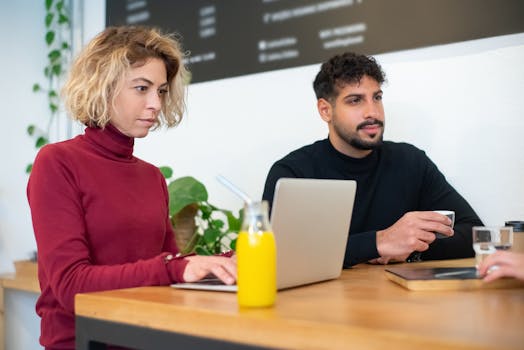Business meeting in a friendly cafeteria, fostering teamwork and collaboration.