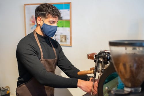 Free A Barista Making a Coffee Drink Stock Photo