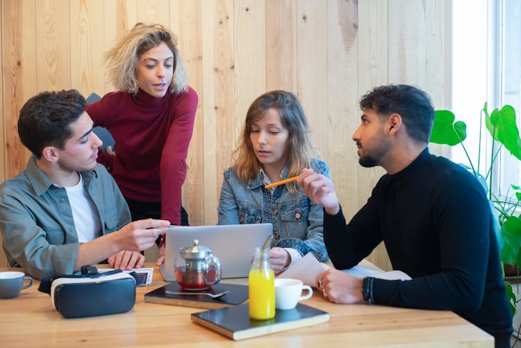 Business People Collaborating In A Meeting