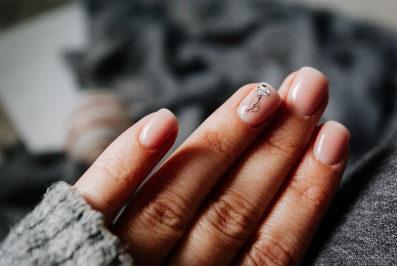 Barely-there nude manicure