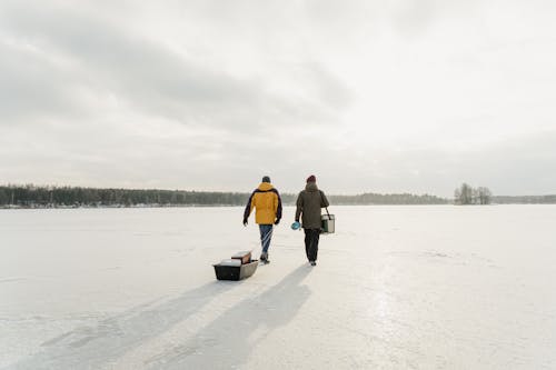 Explorers Out Walking in Frozen Lake