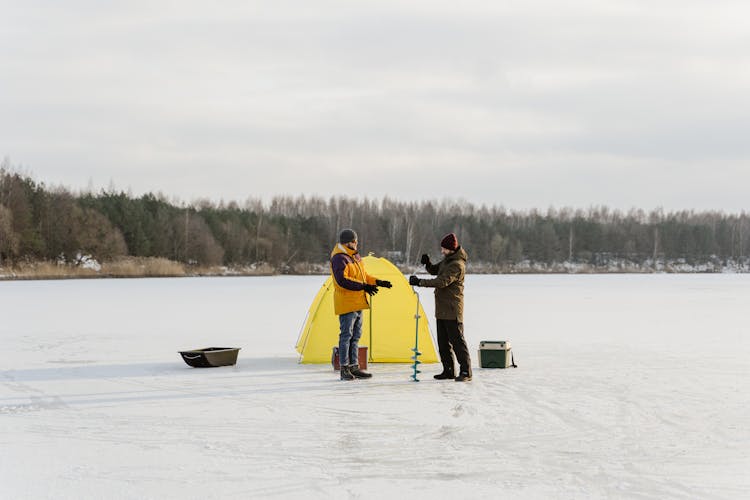 Men Fishing On The Lake