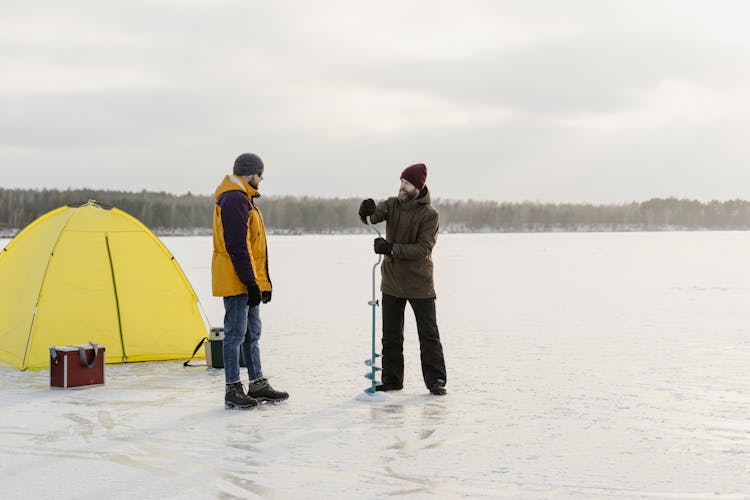 Men Fishing On The Lake