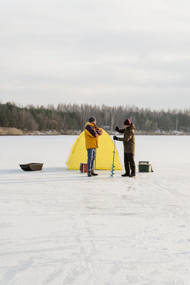 Men Fishing On The Lake