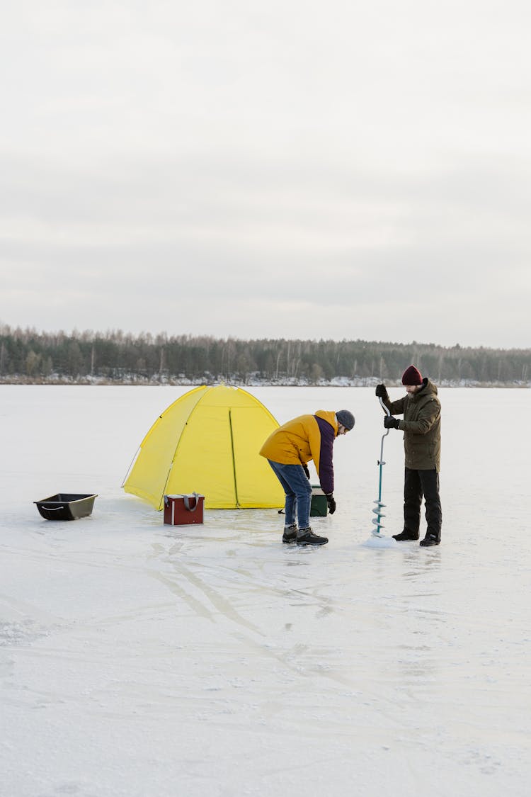 Men Fishing On The Lake