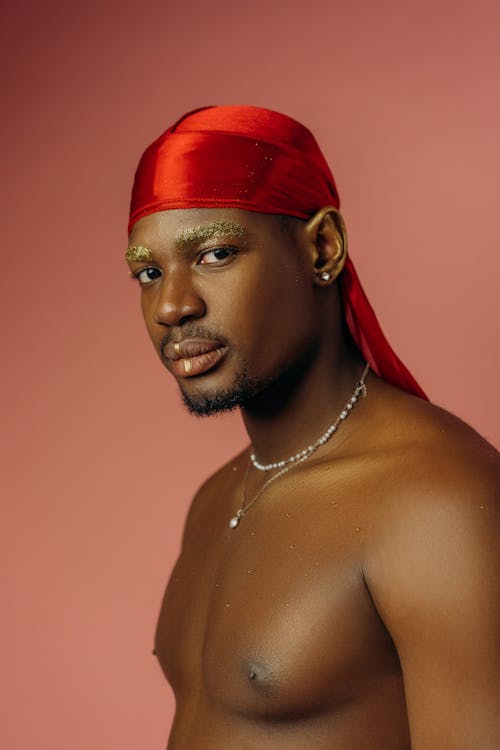 Topless Man Wearing Red Headscarf