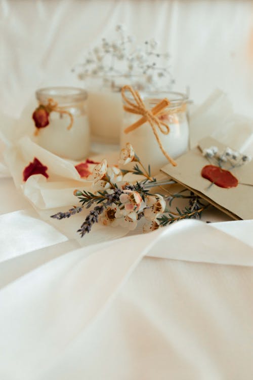 Flowers and candles on textile