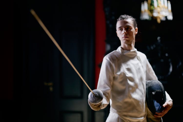 A Man Holding Fencing Sword