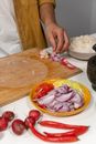 A Person Preparing a Spring Roll