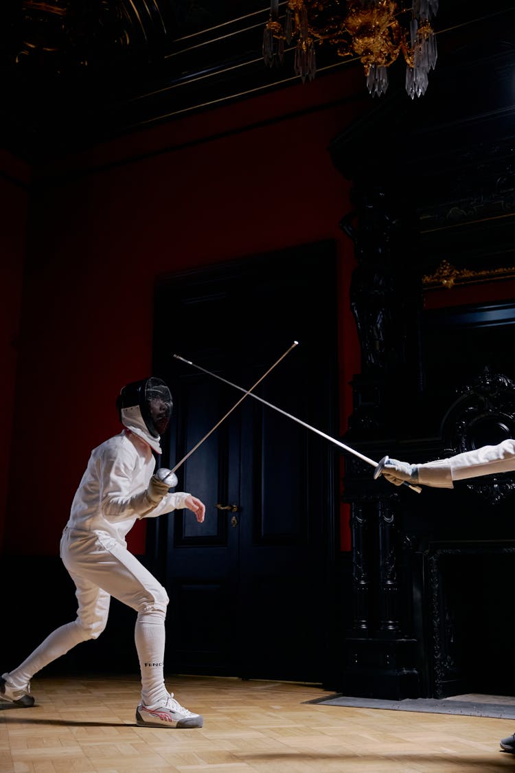 Person Playing Fencing