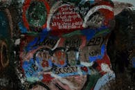 Old paintings and inscriptions on shabby stone