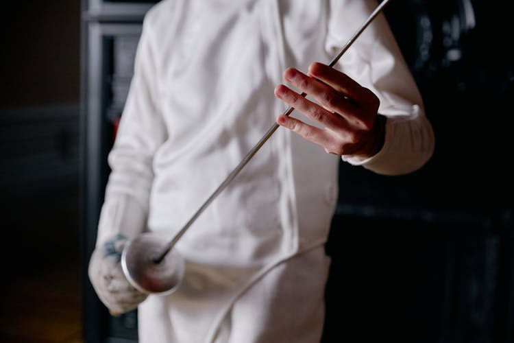 A Fencer Holding A Sword