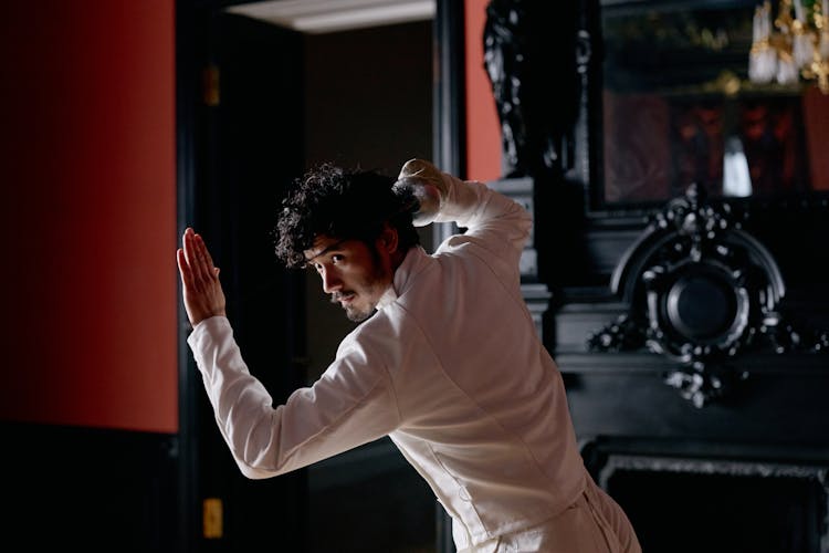 A Man Holding Fencing Sword