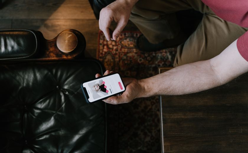 person using smartphone for online dating