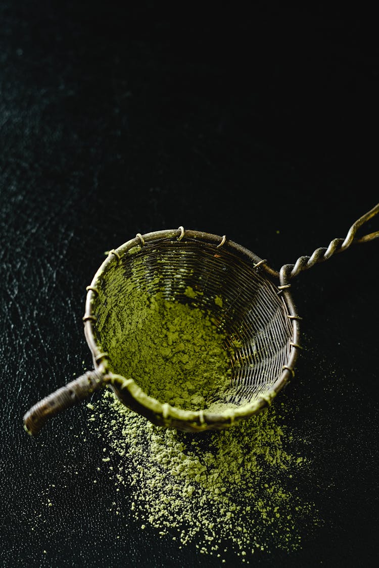 Matcha Powder In Bamboo Strainer