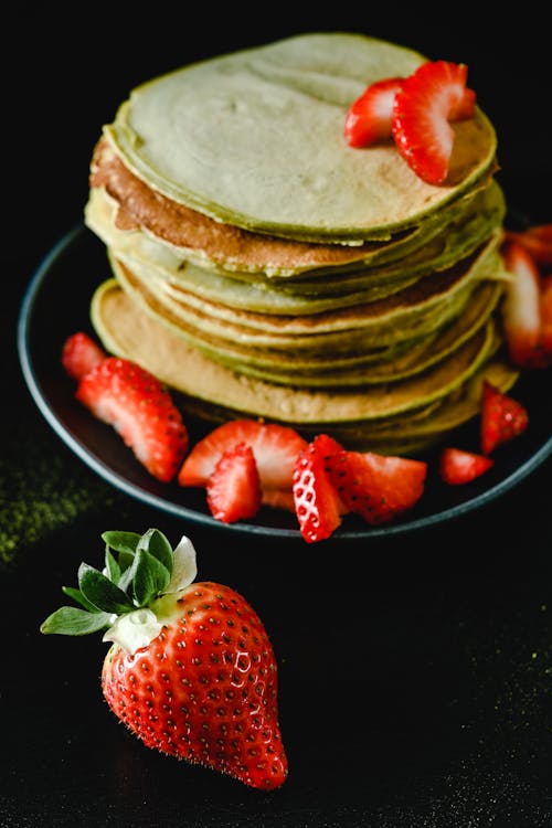 Matcha Pancakes with Slices of Strawberry