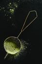 A Silver Sieve with Matcha Powder