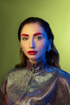 Woman with Sequence on Face and Red Lipstick