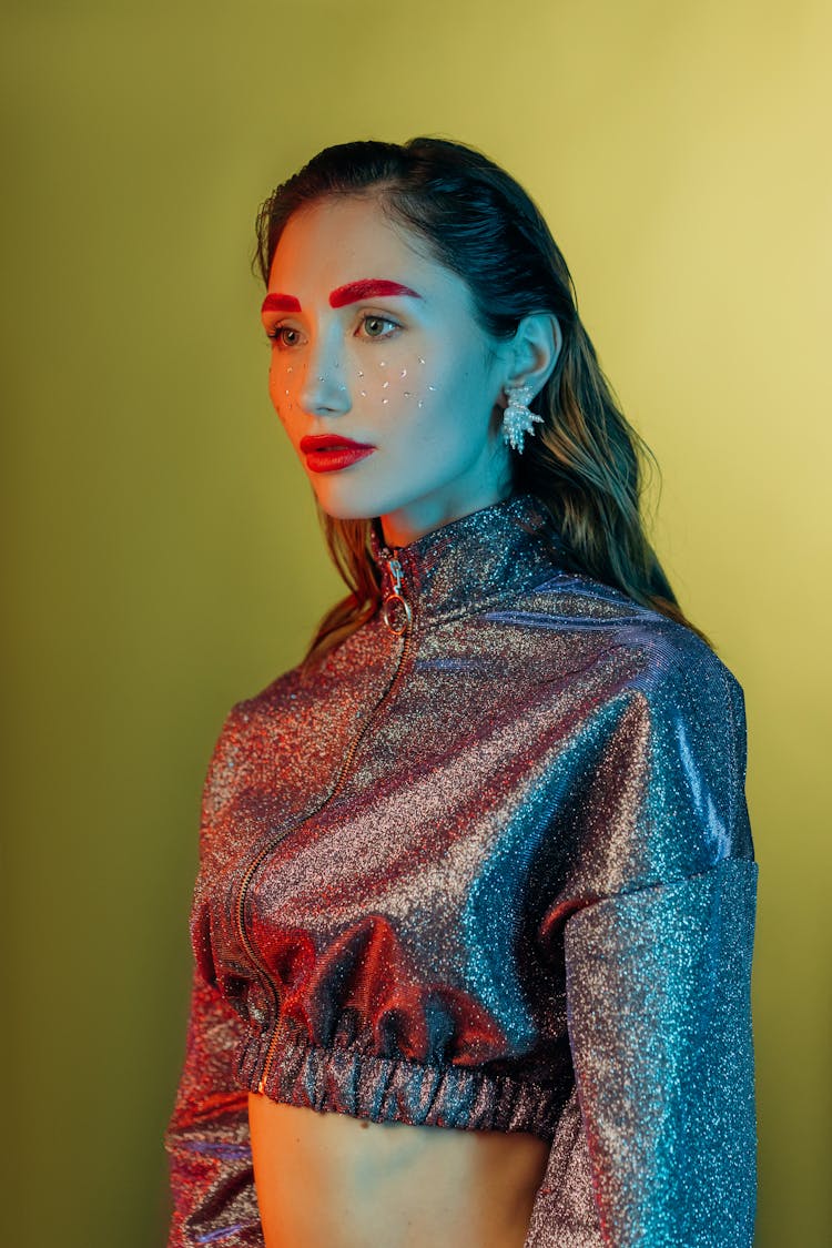 Woman With Sequence On Face And Red Lipstick