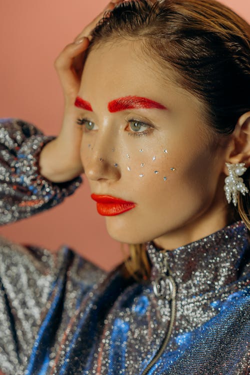 Woman in Red Lipstick and Blue and White Floral Shirt