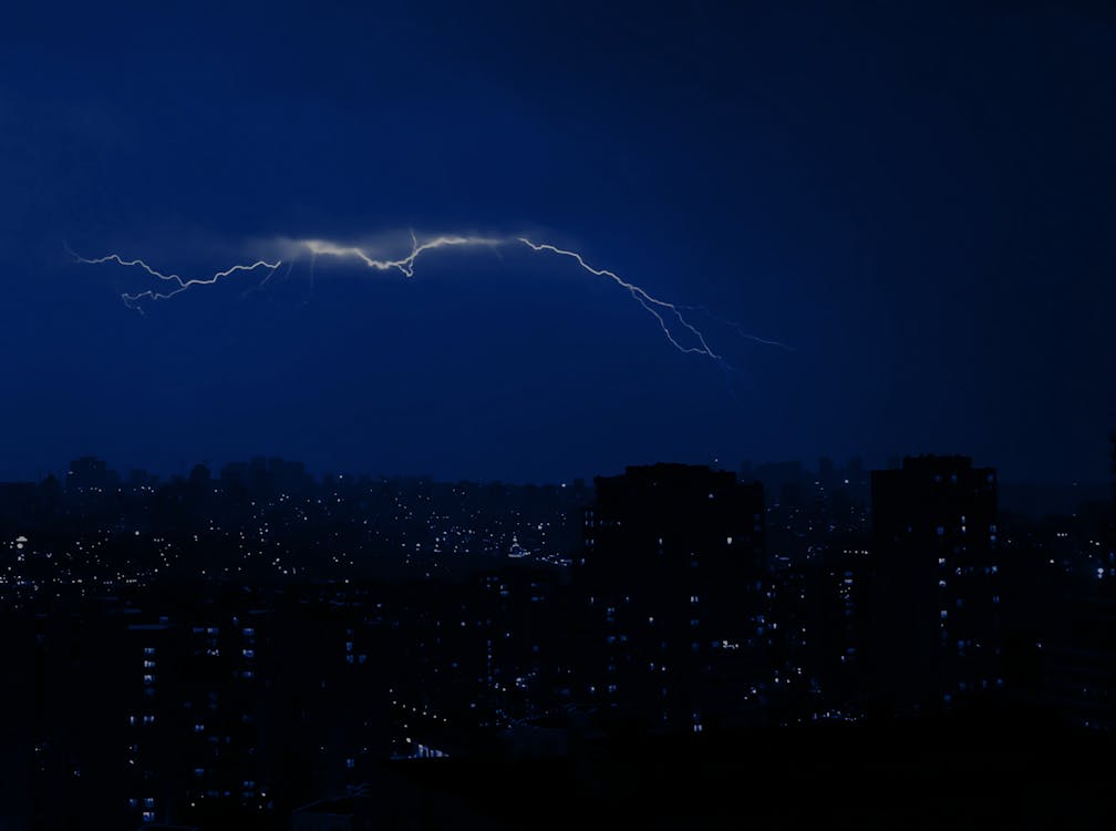Lightning over City at Night · Free Stock Photo